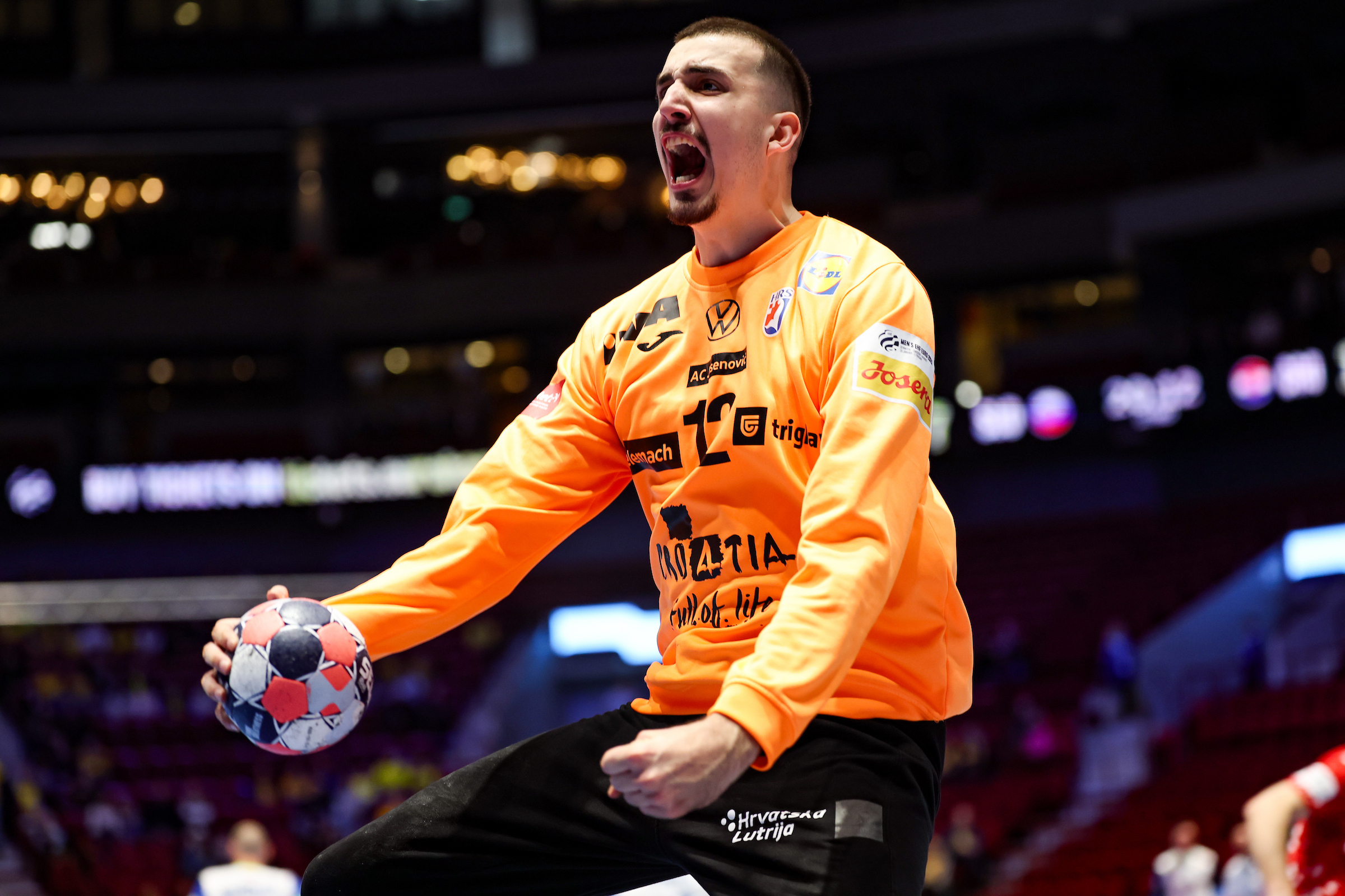 Croatia edge Slovenia in derby to keep semi-final push on track