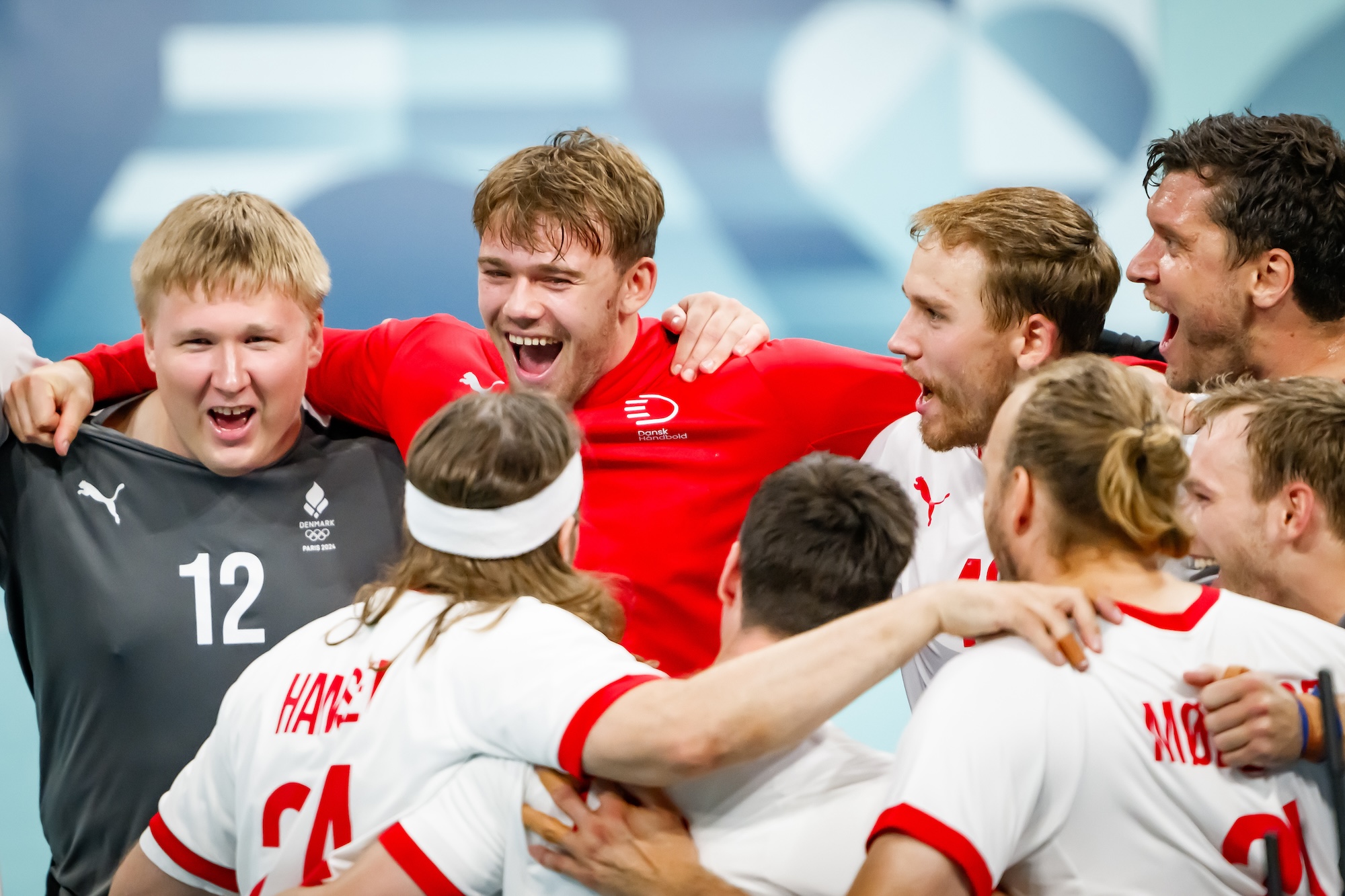 Respect Your Talent players celebrate Olympic medals